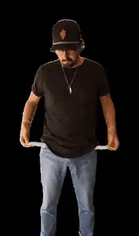 Man shrugging with empty pockets