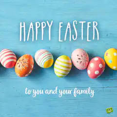 Happy Easter eggs on blue wood