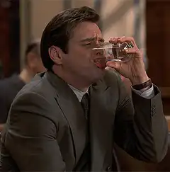 Jim Carrey spits out water