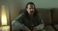 A. Man drinking beer