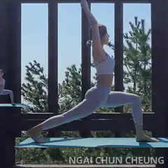 Woman doing yoga on a floating mat