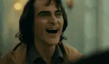 Joaquin Phoenix laughing hysterically