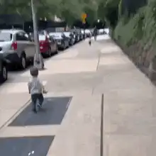 two toddlers running to hug