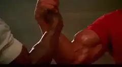 Arnold Schwarzenegger flexes muscles