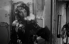 Dolores Del Rio smoking cigarette