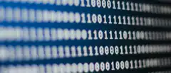 Scrolling binary code on blue screen
