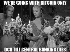 Two women blowing out candles with bitcoin text