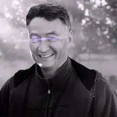 Man with glowing purple eyes