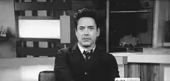 Robert Downey Jr. laughing and waving