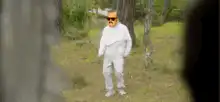 Saul Goodman standing in the woods