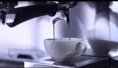 espresso pouring into cup