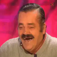 Man with mustache laughing hysterically