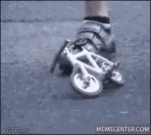 Tiny bike on foot