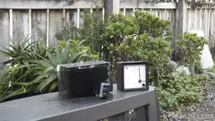 Car battery smoking in garden