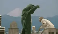 Gamera and a man dancing