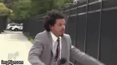 Man in suit yelling let me out